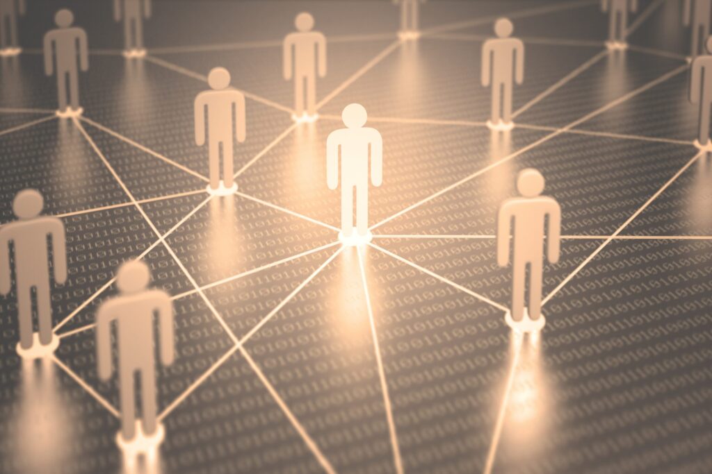 a netweork of many little golden figures connected by golden lines